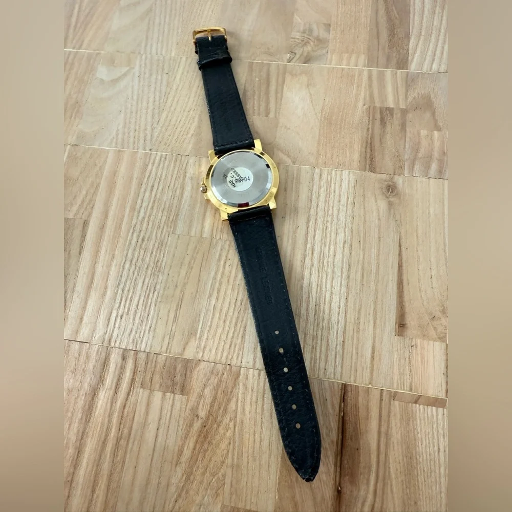 Vintage John weitz gold tone black leather watch NEW BATTERY